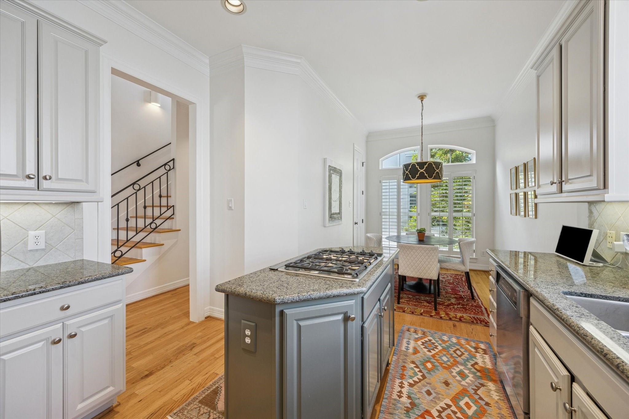 2700 Wroxton Road West University Place, TX 77005 - Photo 15 of 32 a kitchen that has a lot of cabinets in it and appliances