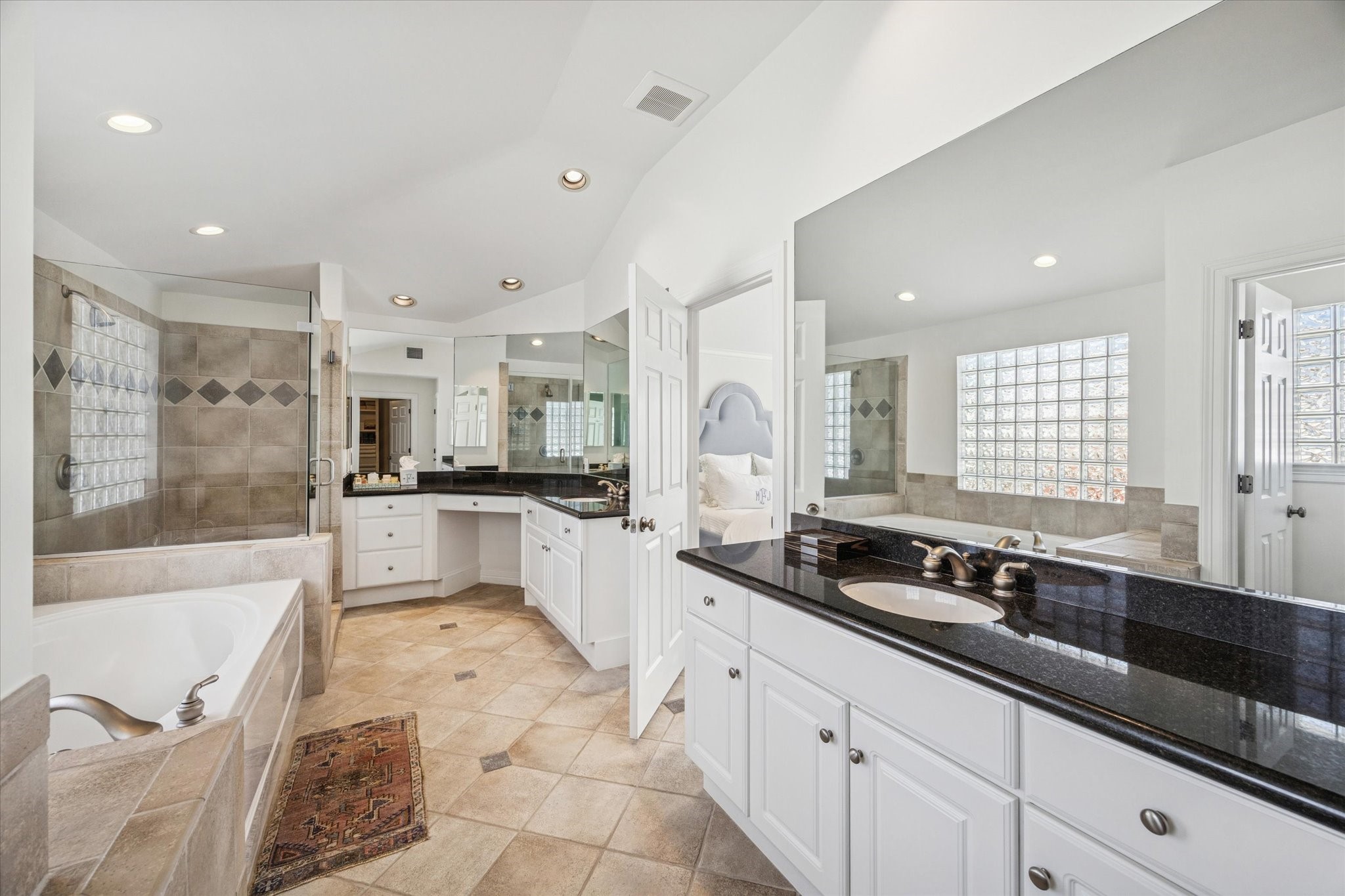 2700 Wroxton Road West University Place, TX 77005 - Photo 22 of 32 a large white kitchen with a large window