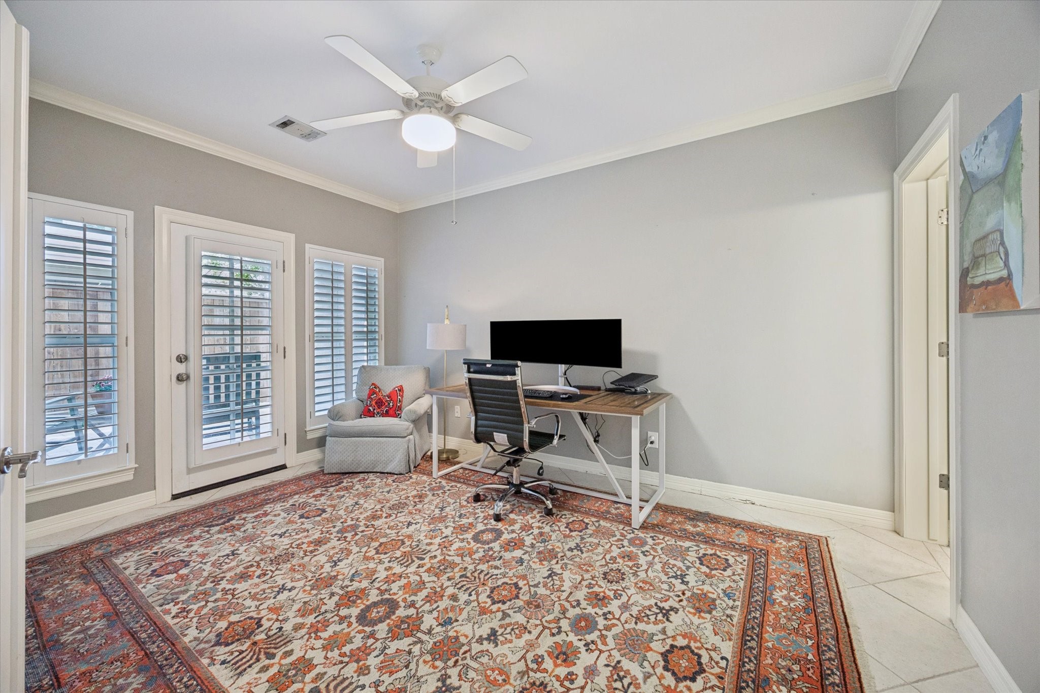 2700 Wroxton Road West University Place, TX 77005 - Photo 6 of 32 a living room with furniture and a flat screen tv