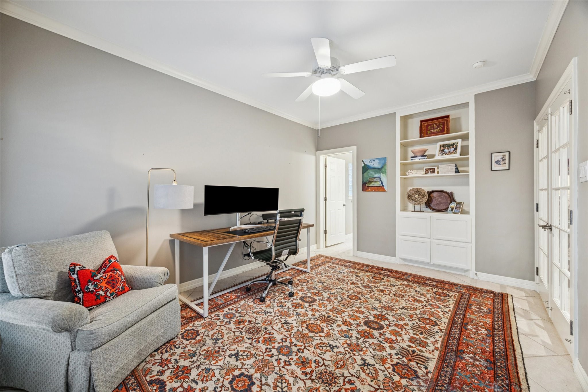 2700 Wroxton Road West University Place, TX 77005 - Photo 7 of 32 a living room with furniture and a flat screen tv