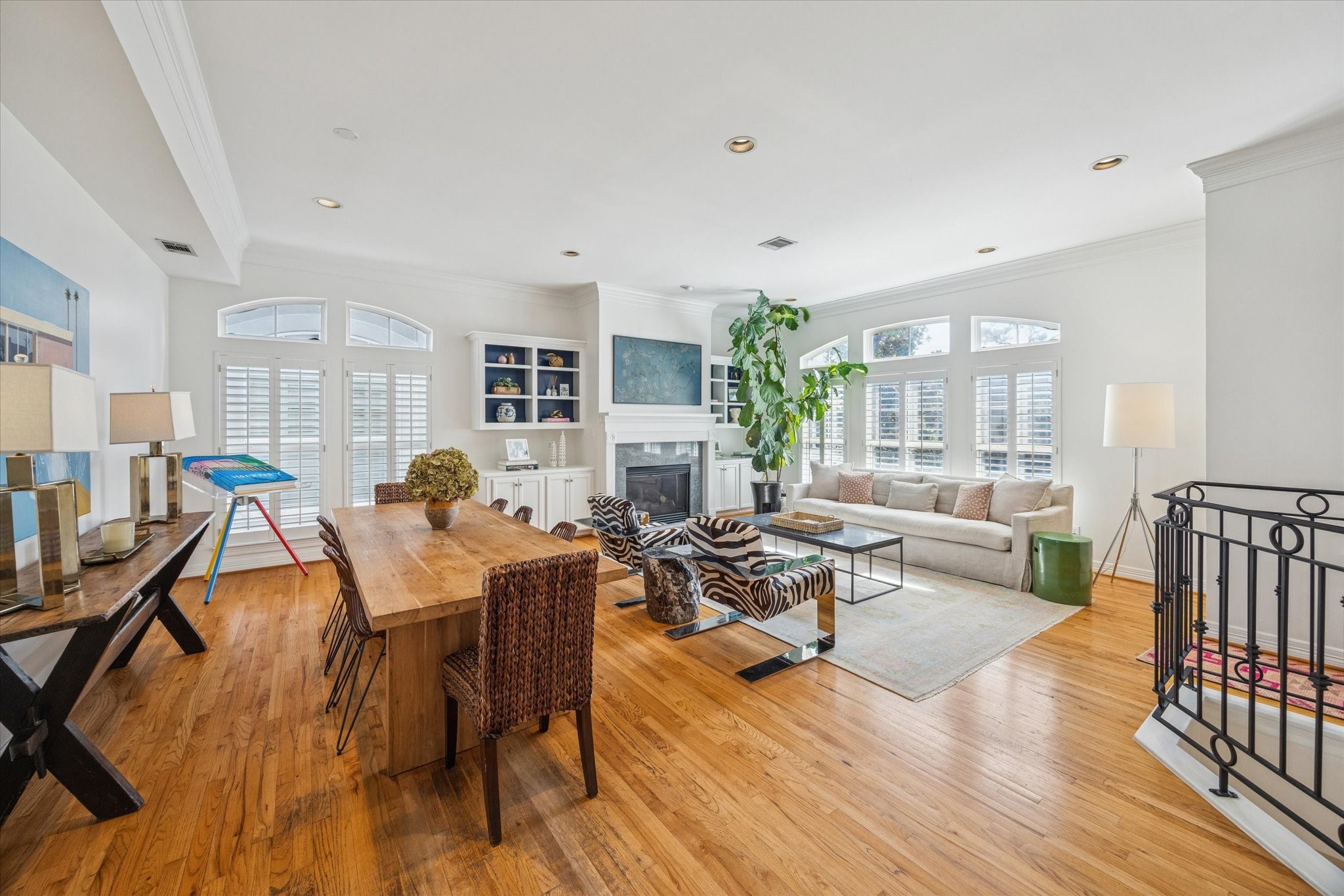 2700 Wroxton Road West University Place, TX 77005 - Photo 9 of 32 a living room with furniture dining table and wooden floor