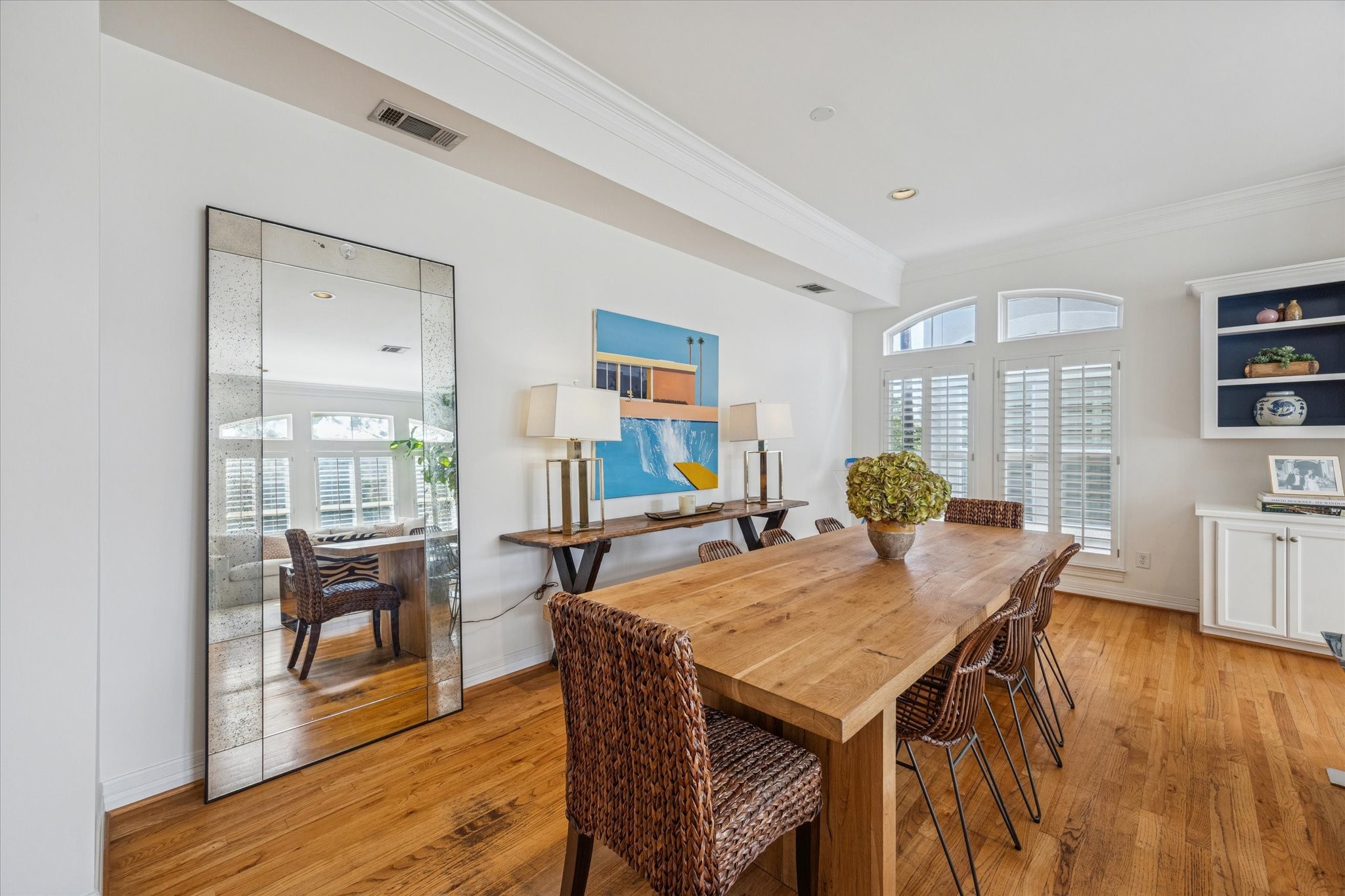 2700 Wroxton Road West University Place, TX 77005 - Photo 10 of 32 a view of a dining room with furniture and wooden floor