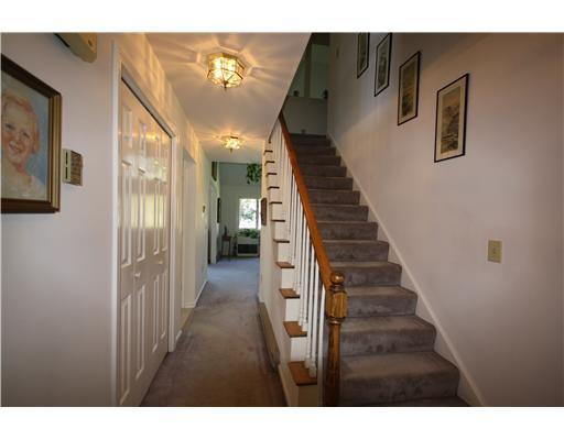 15 West Harbor Pond Road, Unit 15D West Boothbay Harbor, ME 04575 - Photo 6 of 10 Other. Entry Foyer and stairs to...