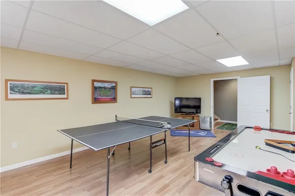 a workspace with furniture and wooden floor