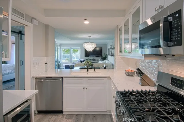 $975,000 | 220 Nice Lane, Unit 215, Newport Beach, CA 92663