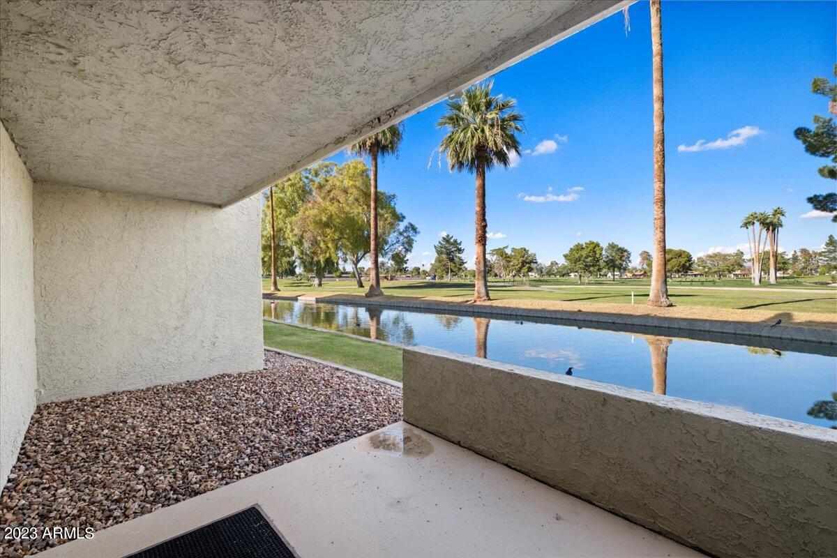 2524 South El Paradiso, Unit 50 Mesa, AZ 85202 - Photo 22 of 36 a view of swimming pool with outdoor seating