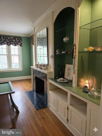 a view of a livingroom with wooden floor