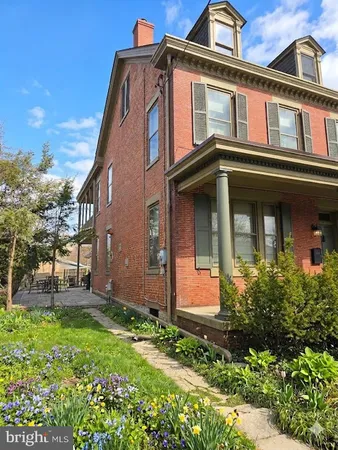 front view of house with a yard