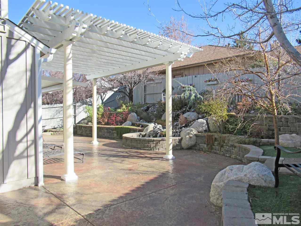 2509 Starr Meadows Loop Reno, NV 89519 - Photo 15 of 18 a view of living room and patio area