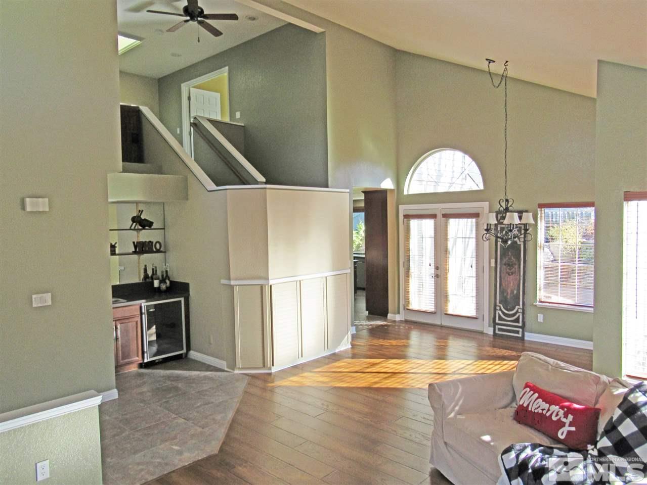 2509 Starr Meadows Loop Reno, NV 89519 - Photo 2 of 18 a view of a livingroom with furniture and a kitchen