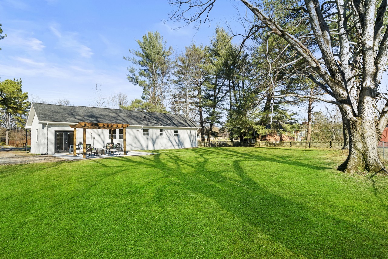 209 Stable Road Franklin, TN 37069 - Photo 25 of 25 a view of yard with swimming pool and green space