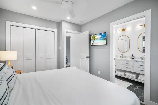 a bedroom with a bed and a closet