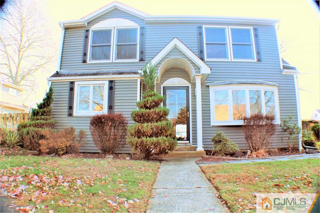 17 Rodney Road East Brunswick, NJ 08816 - Photo 1 of 16 a front view of a house with garden