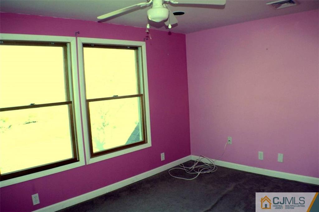 17 Rodney Road East Brunswick, NJ 08816 - Photo 9 of 16 a room with windows