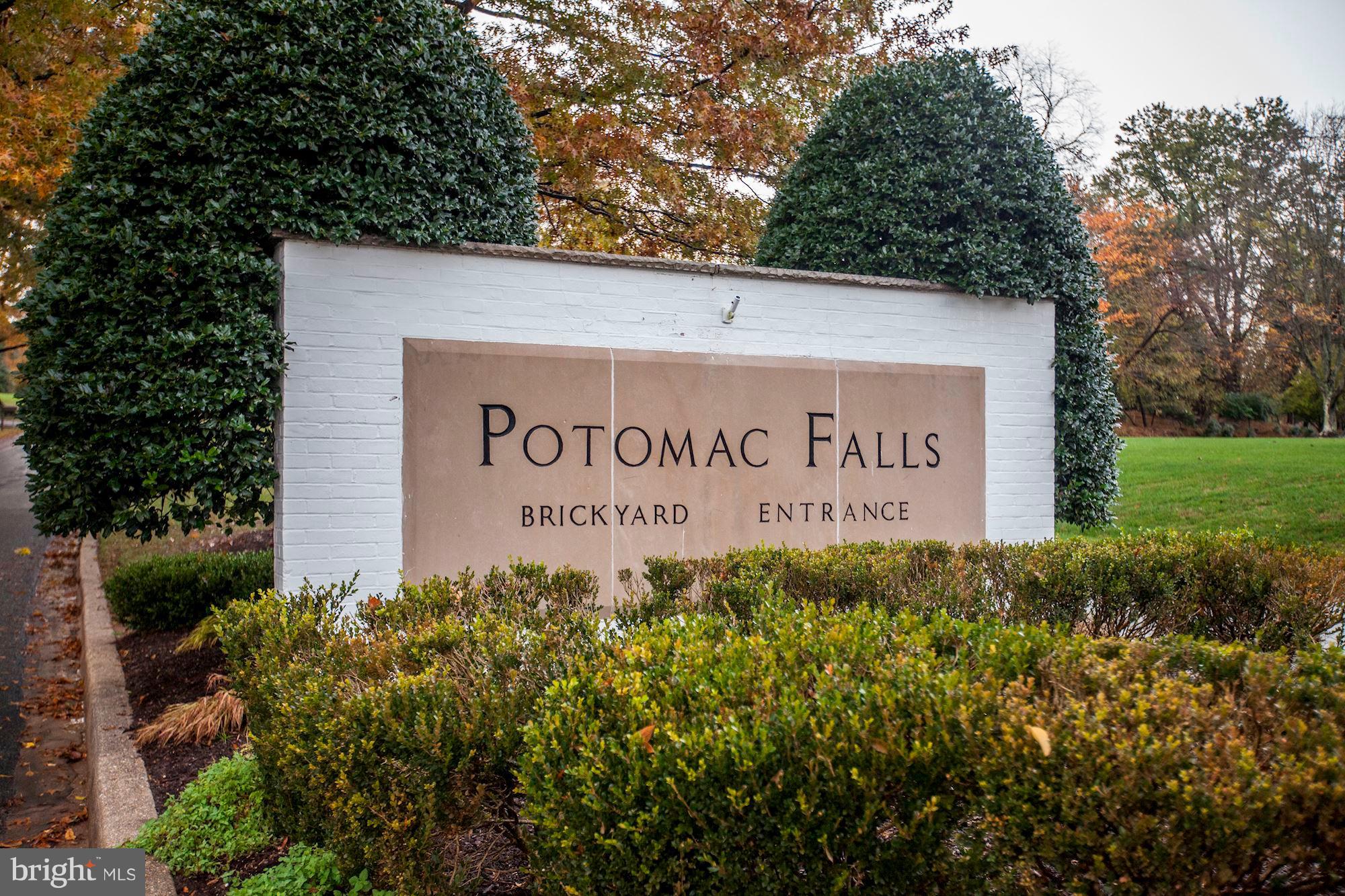 11000 Cripplegate Road Potomac, MD 20854 - Photo 2 of 44 a sign on the side of the building