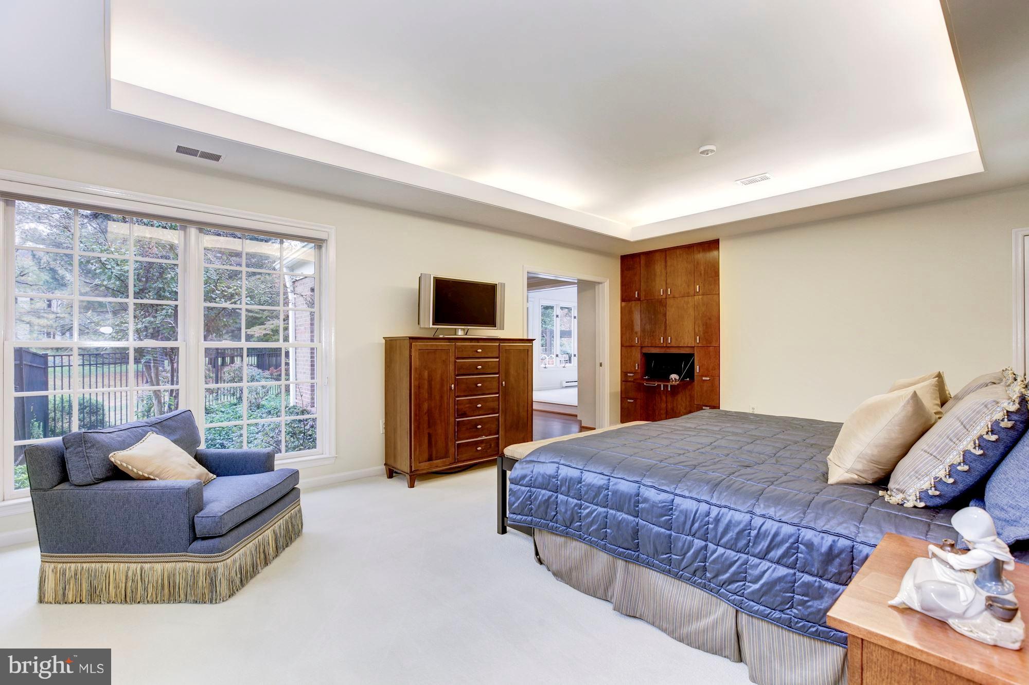11000 Cripplegate Road Potomac, MD 20854 - Photo 22 of 44 a bedroom with furniture and a flat screen tv