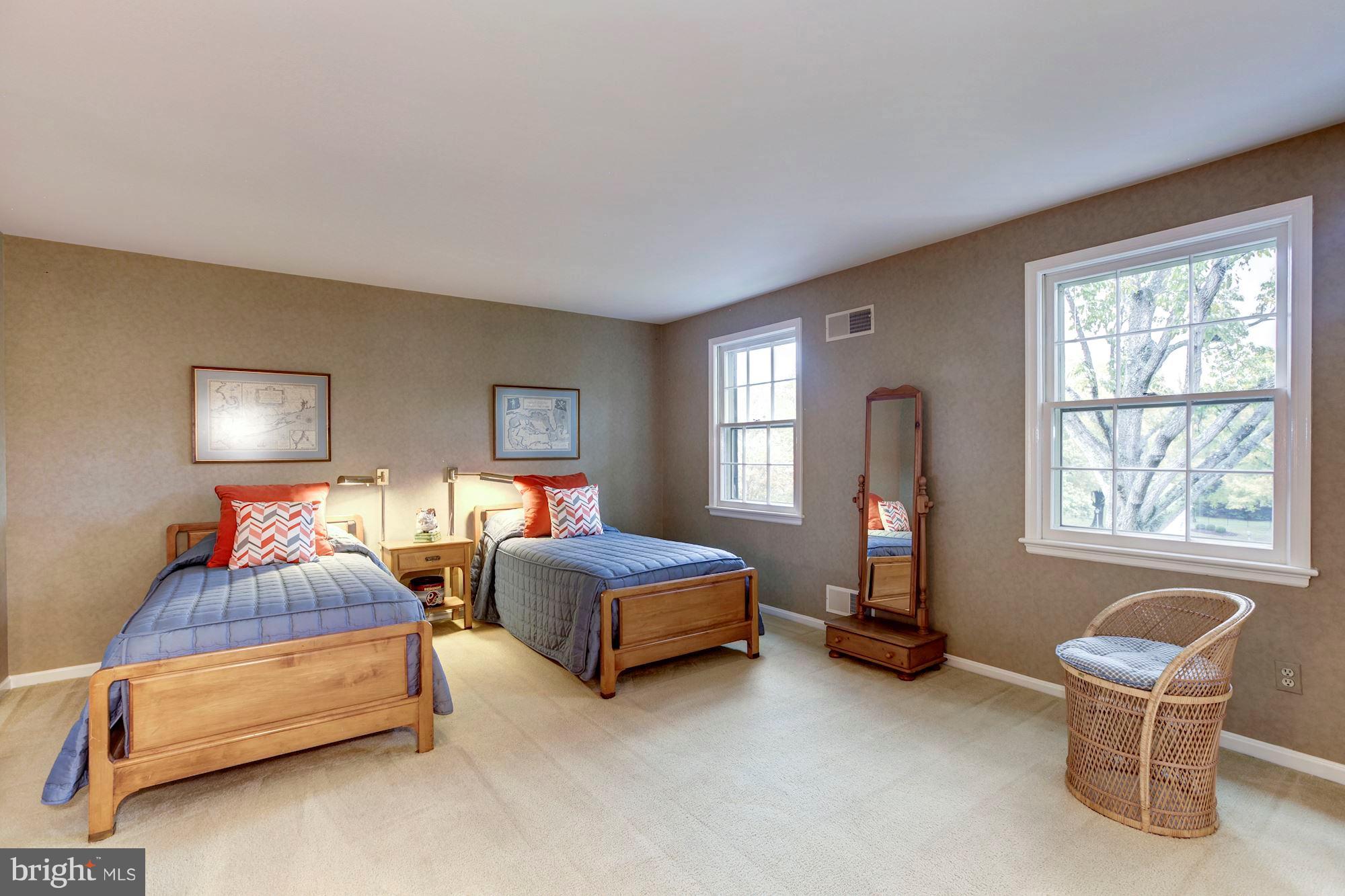 11000 Cripplegate Road Potomac, MD 20854 - Photo 29 of 44 a bedroom with two beds and a window