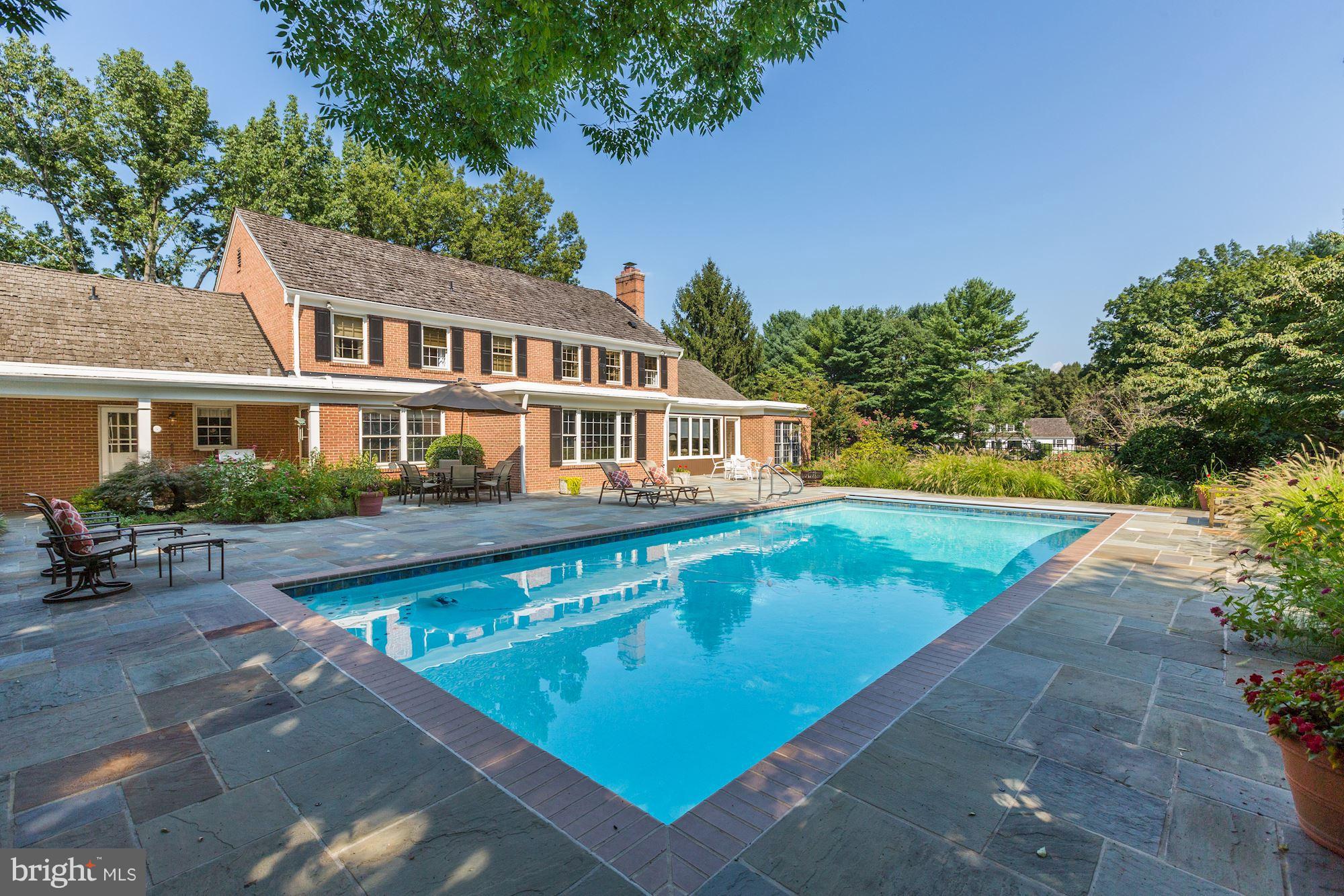 11000 Cripplegate Road Potomac, MD 20854 - Photo 37 of 44 a view of a house with swimming pool