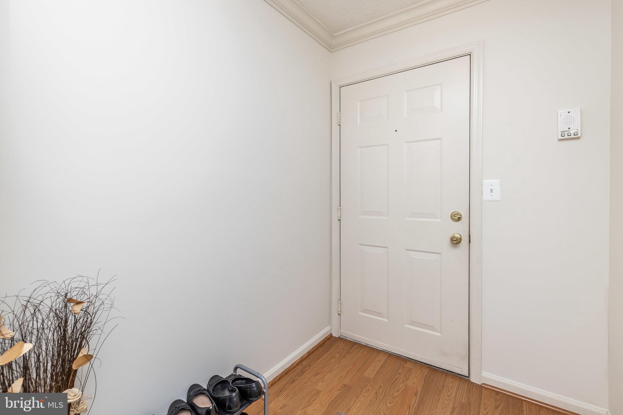 9601 Haven Farm Road, Unit E Perry Hall, MD 21128 - Photo 5 of 30 Foyer with wood floors