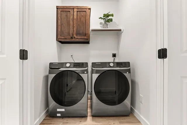 a utility room with dryer and washer