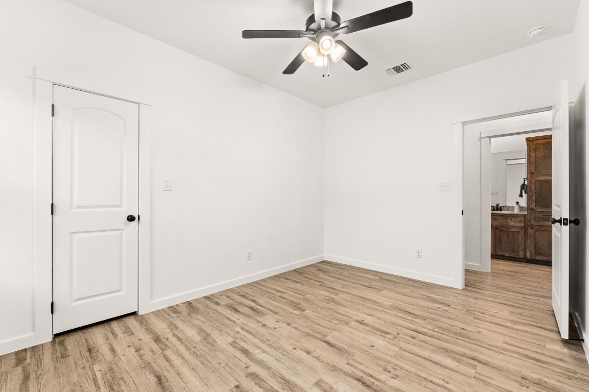 3602 Canvasback Road Killeen, TX 76542 - Photo 17 of 29 wooden floor in an empty room with a window
