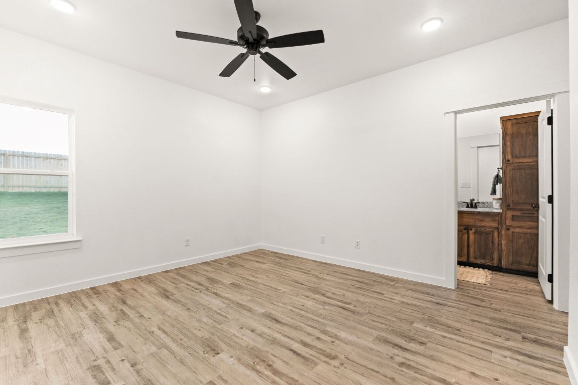3602 Canvasback Road Killeen, TX 76542 - Photo 20 of 29 wooden floor in an empty room with a window