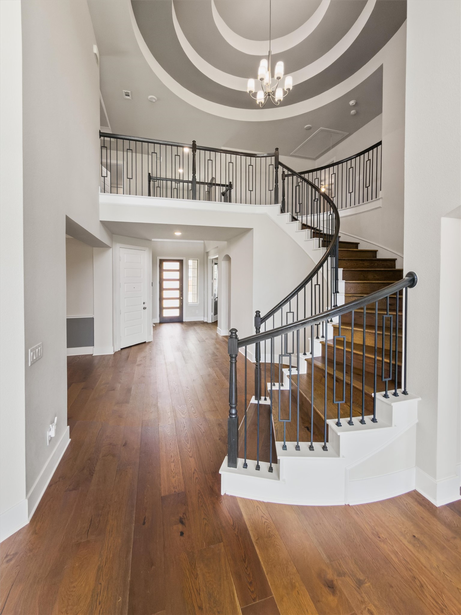 108 Rio Vista Drive Georgetown, TX 78626 - Photo 8 of 40 a view of entryway and hall with wooden floor