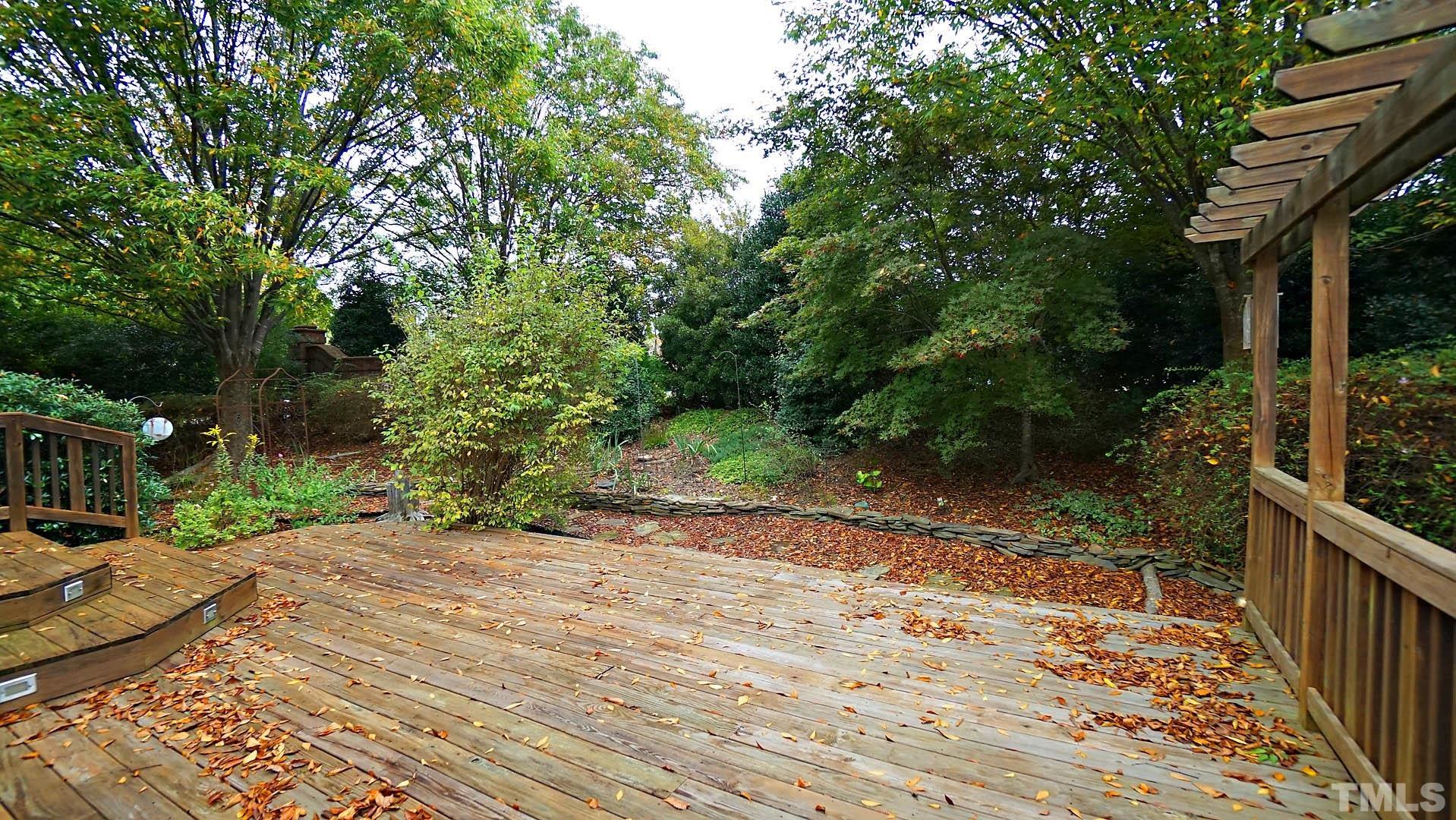 8316 Trumpetor Way Raleigh, NC 27613 - Photo 24 of 26 a pathway of a yard