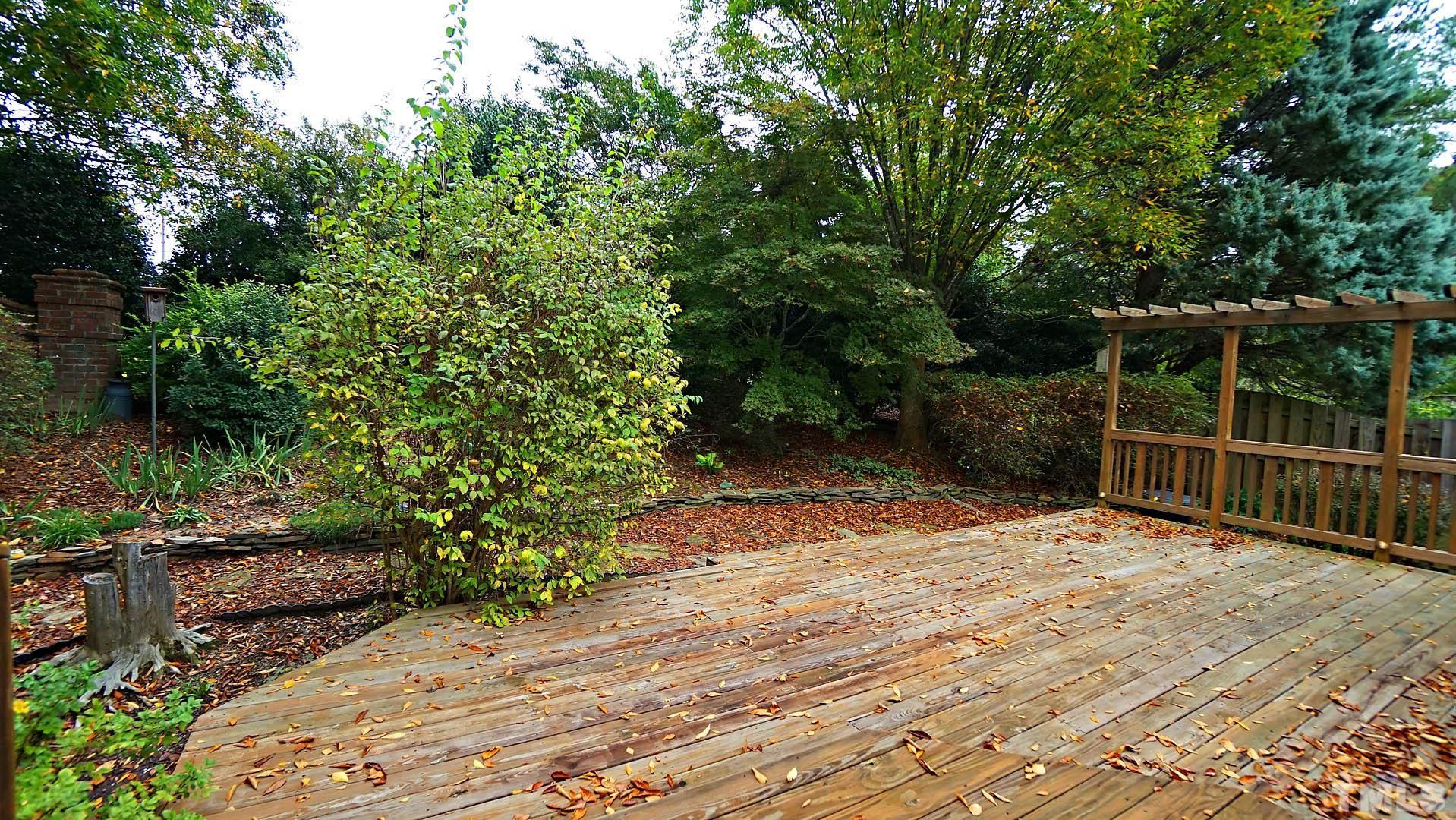 8316 Trumpetor Way Raleigh, NC 27613 - Photo 25 of 26 a view of backyard with green space