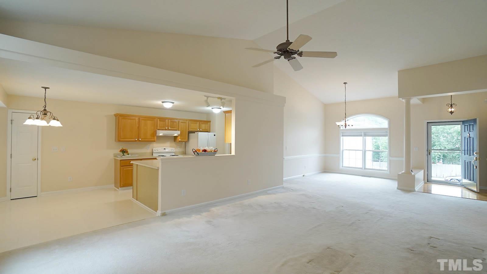 8316 Trumpetor Way Raleigh, NC 27613 - Photo 7 of 26 a view of a kitchen with a sink and a stove top oven