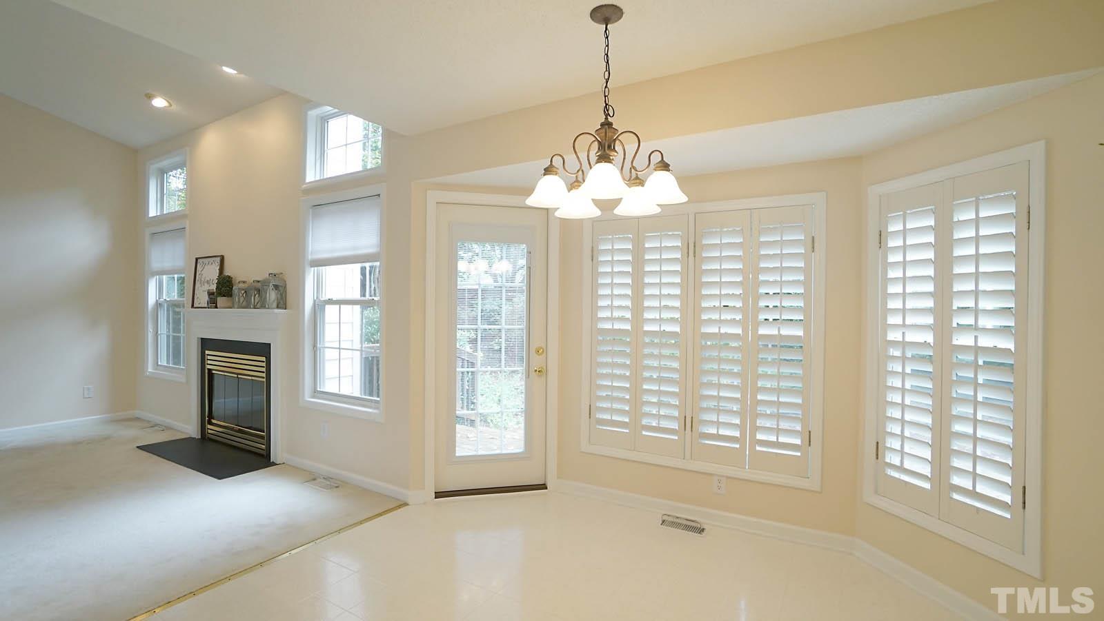 8316 Trumpetor Way Raleigh, NC 27613 - Photo 8 of 26 a view of livingroom with windows