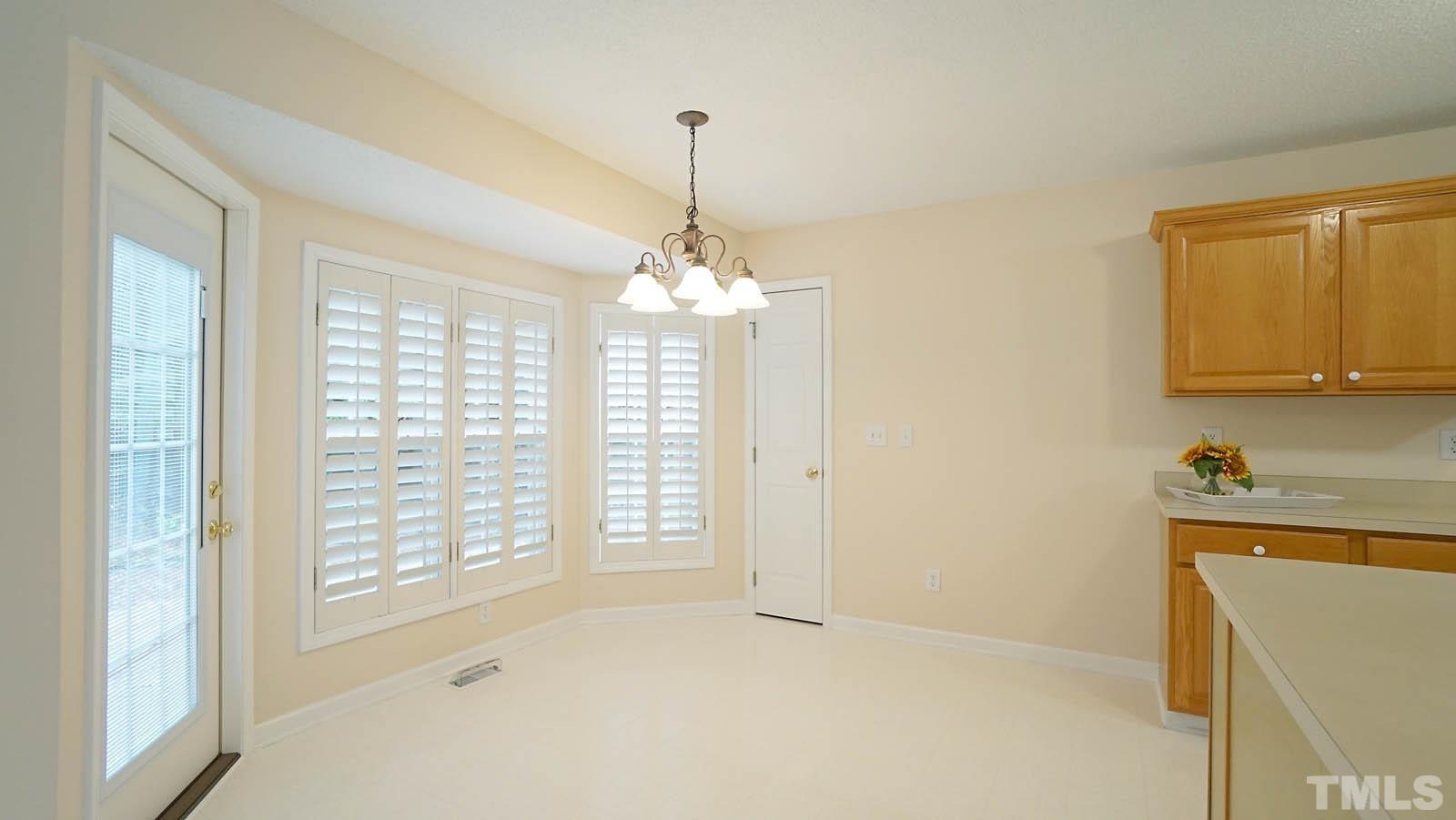 8316 Trumpetor Way Raleigh, NC 27613 - Photo 9 of 26 a very nice looking room with a window