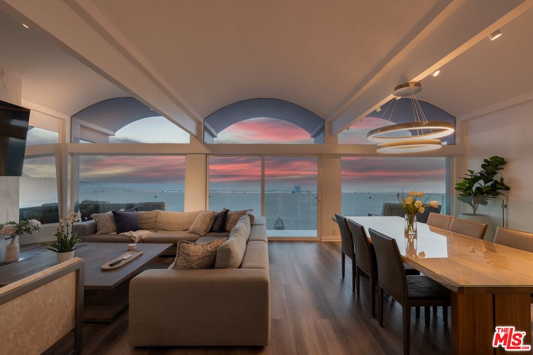 3806 Ocean Front Walk Marina del Rey, CA 90292 - Photo 8 of 40 a living room with furniture and a large window