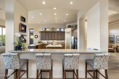 a kitchen with a stove and a sink