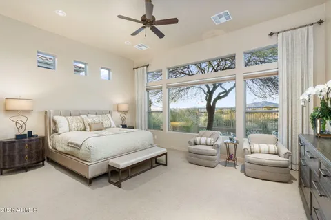 a view of a small yard and a fountain in the balcony