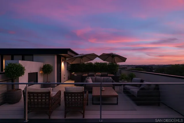 a outdoor living space with furniture and a potted plant