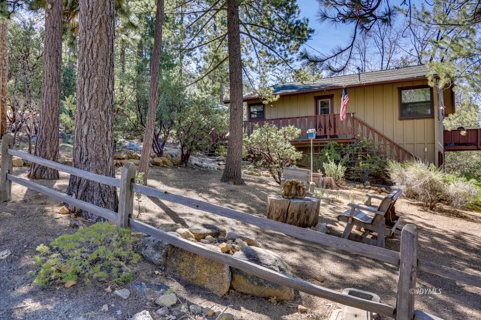 25405 Seneca Road Idyllwild, CA 92549 - Photo 4 of 61 a view of a house with backyard and sitting area