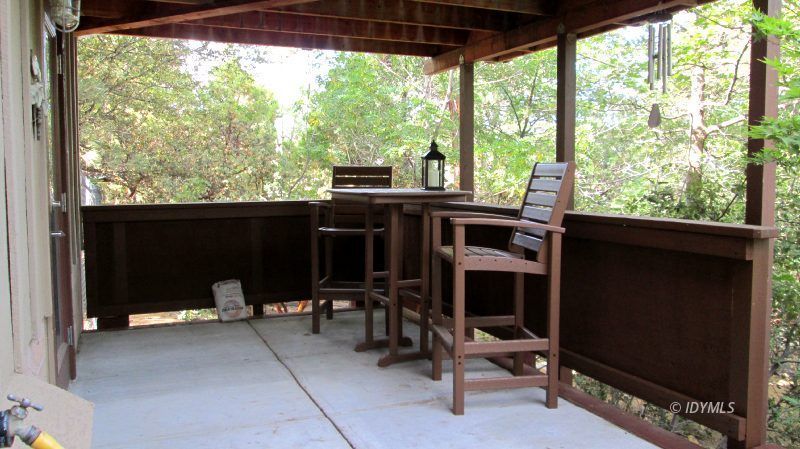 25405 Seneca Road Idyllwild, CA 92549 - Photo 50 of 61 a view of a workspace with furniture and a window