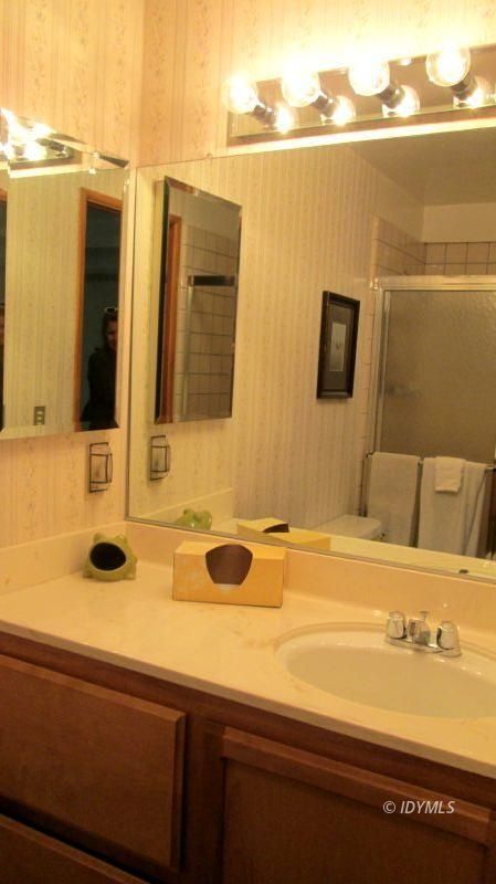 25405 Seneca Road Idyllwild, CA 92549 - Photo 58 of 61 a bathroom with a sink and a mirror