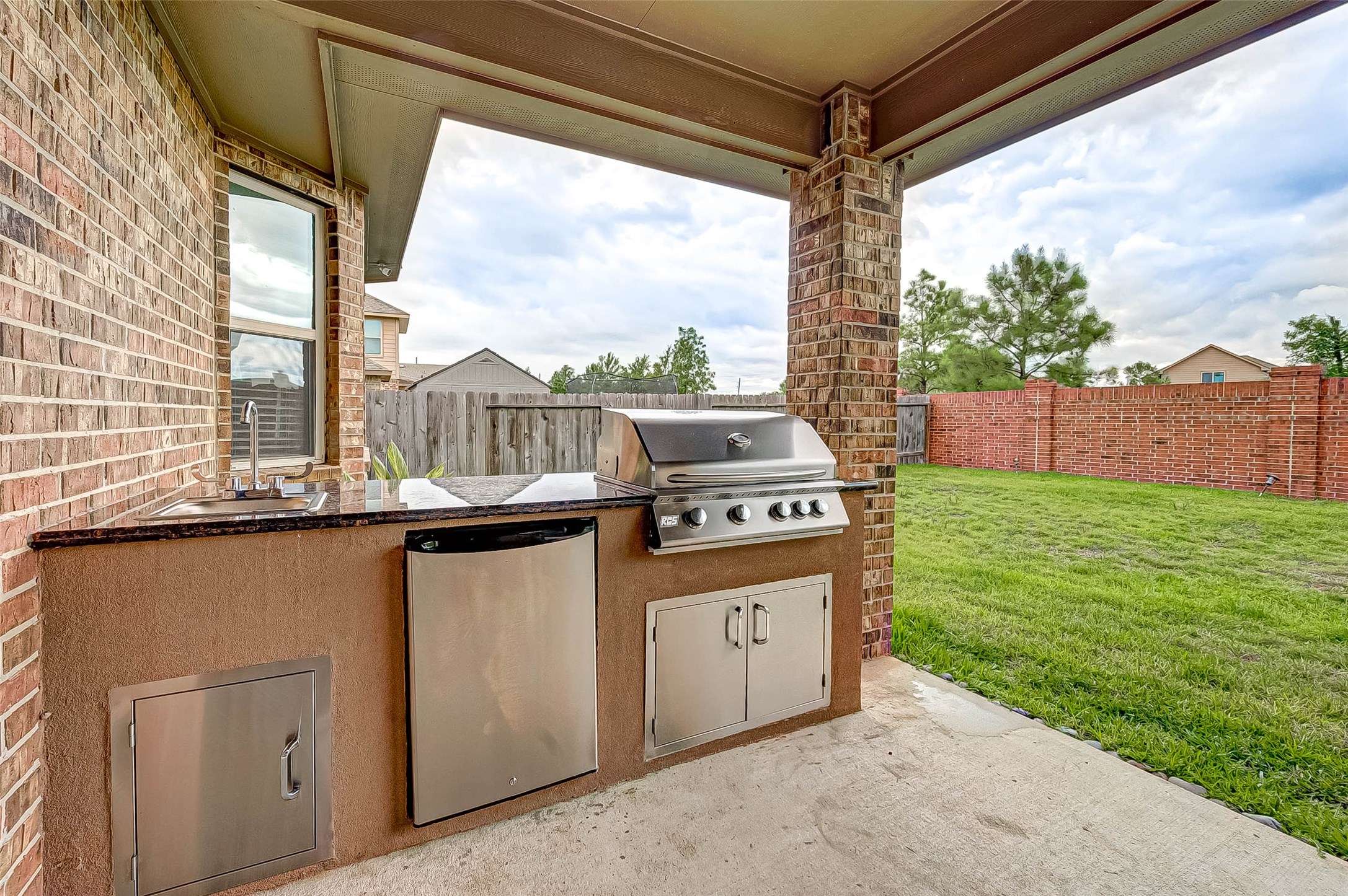 5614 Glenfield Spring Lane Spring, TX 77389 - Photo 34 of 36 Summer Kitchen.