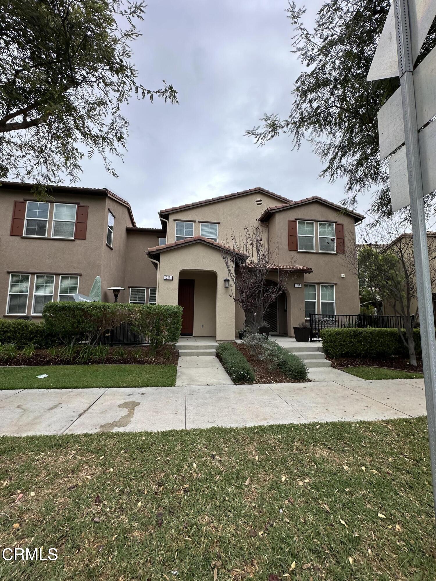 719 Forest Park Boulevard Oxnard, CA 93036 - Photo 31 of 39 a front view of a house with a yard