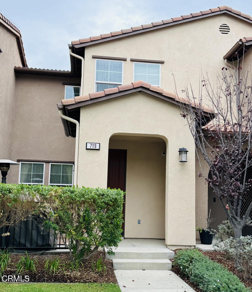 719 Forest Park Boulevard Oxnard, CA 93036 - Photo 34 of 39 a front view of a house with a yard