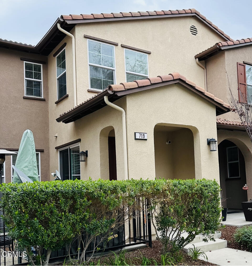 719 Forest Park Boulevard Oxnard, CA 93036 - Photo 36 of 39 a front view of a house with a yard