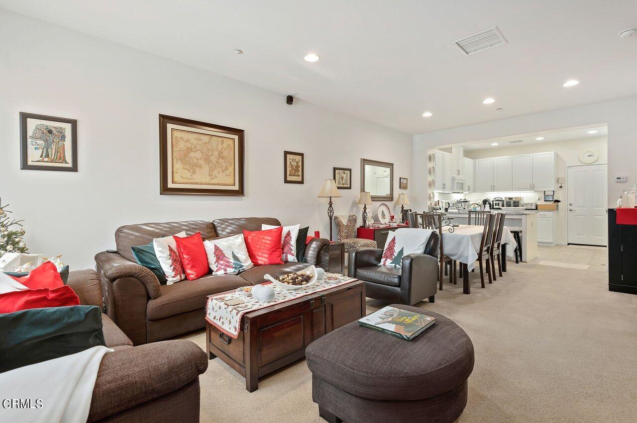 719 Forest Park Boulevard Oxnard, CA 93036 - Photo 8 of 39 a living room with furniture and a table