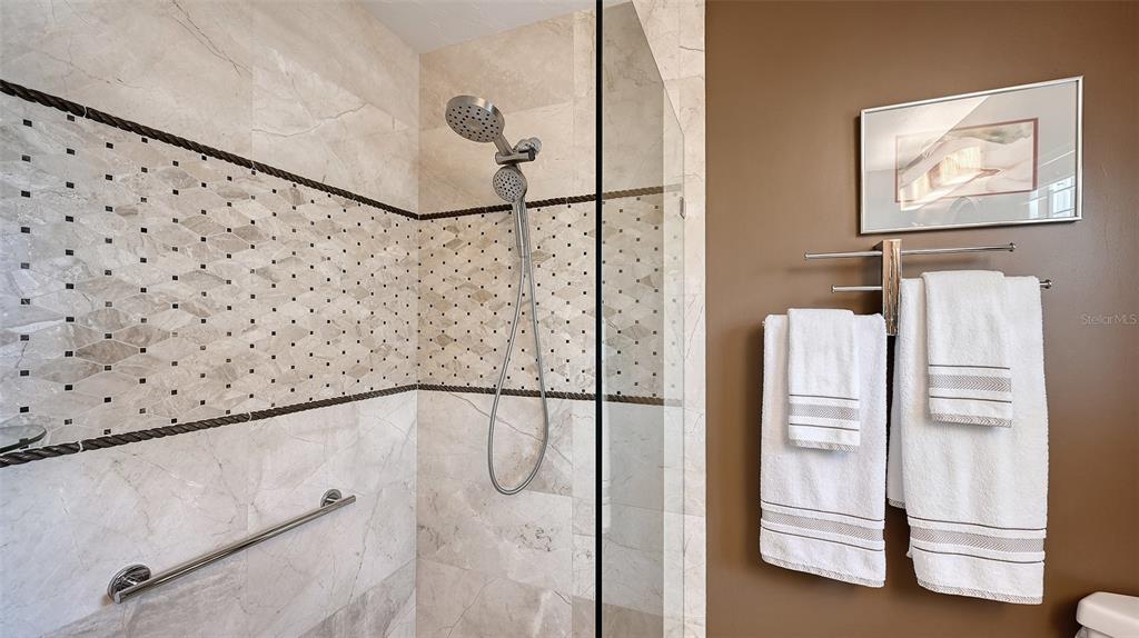 531 Wedge Lane Longboat Key, FL 34228 - Photo 18 of 28 a bathroom with a shower