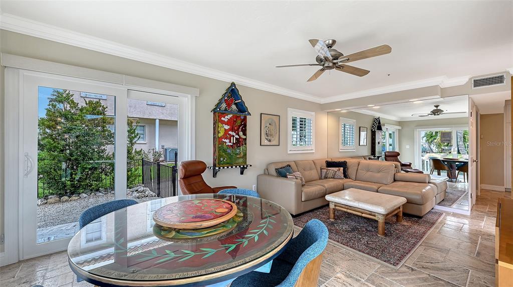 531 Wedge Lane Longboat Key, FL 34228 - Photo 21 of 28 a living room with furniture and a large window