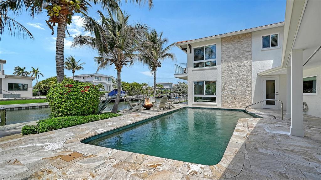 531 Wedge Lane Longboat Key, FL 34228 - Photo 24 of 28 a view of a house with swimming pool