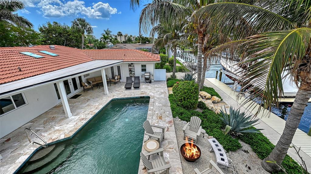 531 Wedge Lane Longboat Key, FL 34228 - Photo 3 of 28 an aerial view of a house with a yard