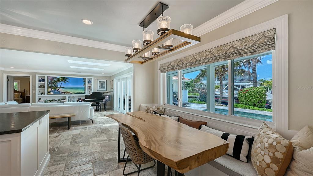 531 Wedge Lane Longboat Key, FL 34228 - Photo 6 of 28 a view of a dining room with furniture window and outside view