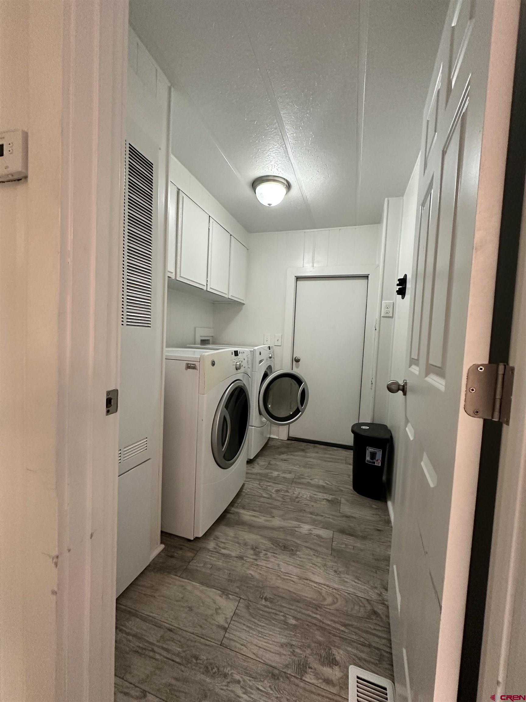 468 Rio Grande Road South Fork, CO 81154 - Photo 19 of 43 a view of a storage and utility room with a washer dryer